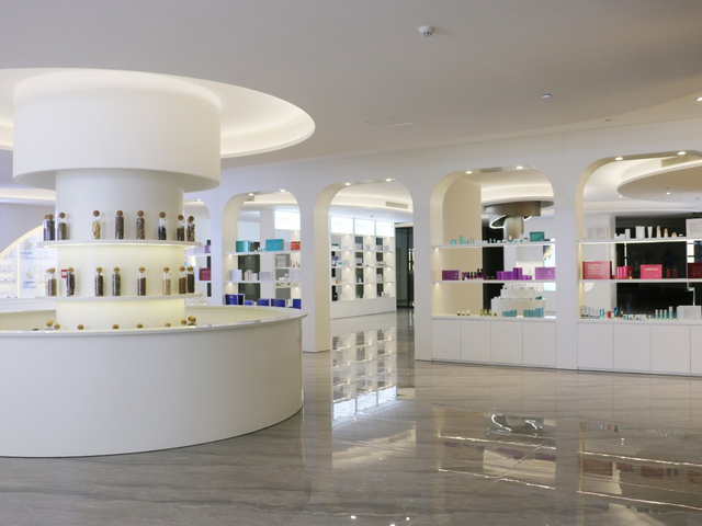 cosmetic showroom displaying skincare, face serum, hair care and body care products